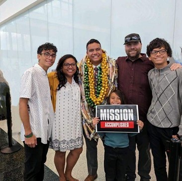 A photo of Dr. Vaiola Grow and her family
