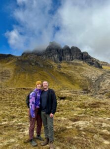 Fun photo of Amy Wysong and her partner on a mountainside.